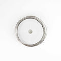 Spool of 18 gauge stainless steel crafting wire on white plastic bobbin
