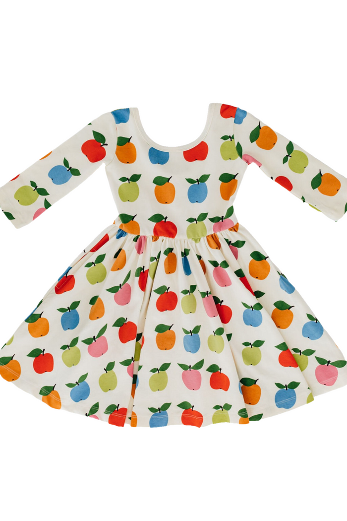 Dress with colorful apple pattern on a white background