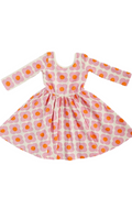 dress with pink and orange floral pattern on a white background