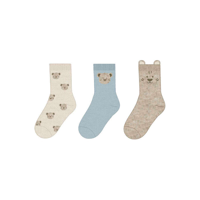 Three pairs of socks with tiger designs on a white background