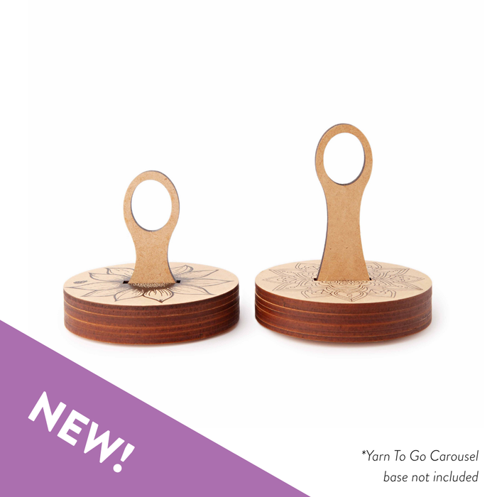 Two wooden yarn bobbins with handles on a white background, labeled 'NEW!'.