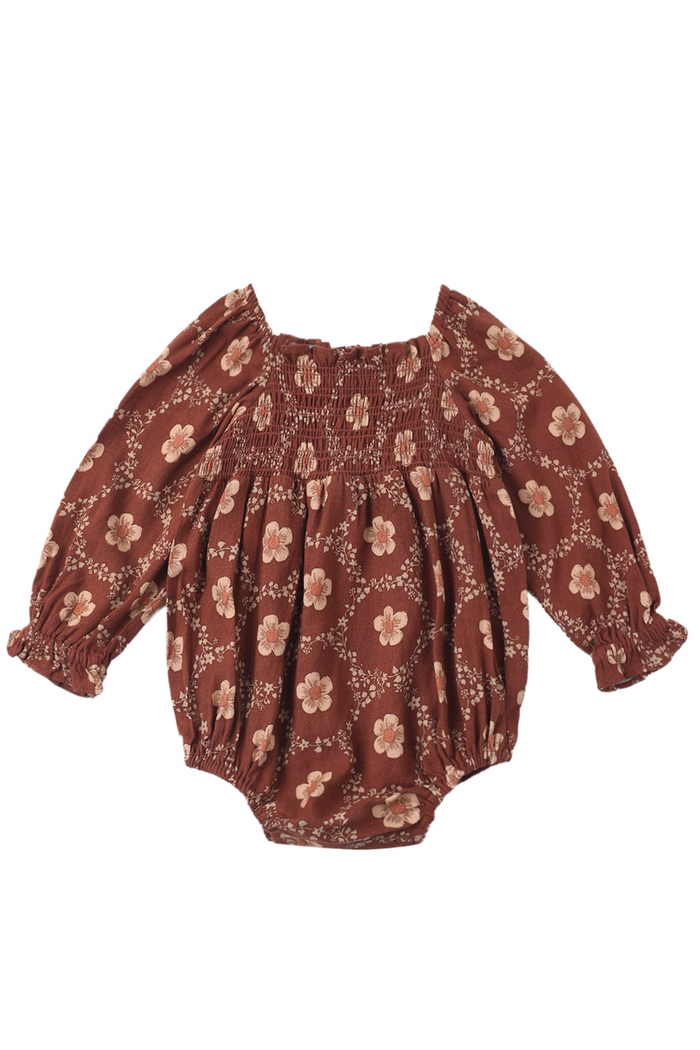 Brown floral baby romper on a white background