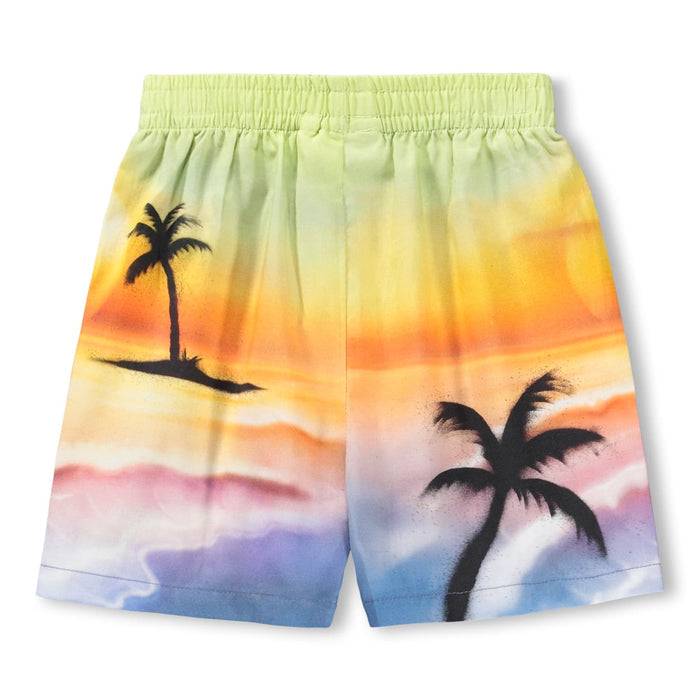 Colorful tie-dye shorts with palm tree designs on a white background