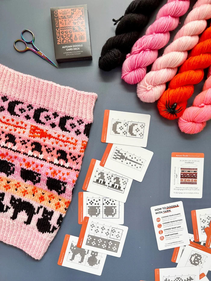 Pink Autumn Doodle colorwork cowl with black cat and bat charts, deck and cards alongside