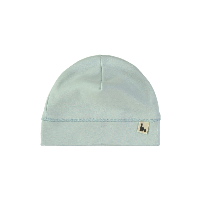 pastel blue baby beanie with brand tag on white background