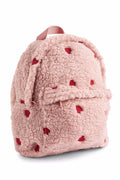 Pink backpack with red heart patterns on a white background
