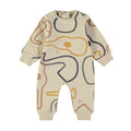 A long-sleeve baby romper in heathered beige with an abstract line art print in mustard yellow, navy blue, and sage green, shown flat on a white background.