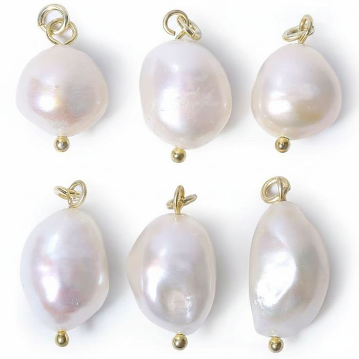 Six unique, irregular-shaped baroque pearls with a high-luster iridescent finish and gold-tone jump rings, arranged on a clean white background for a minimalist jewelry display.