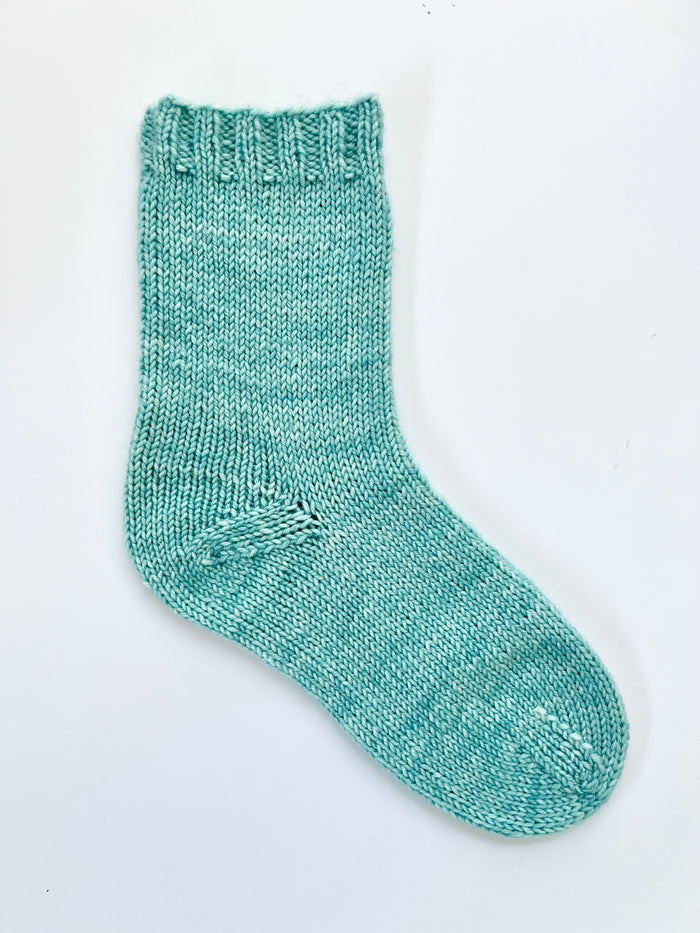 Light teal Base Doodle Top-Down Sock in DK weight yarn