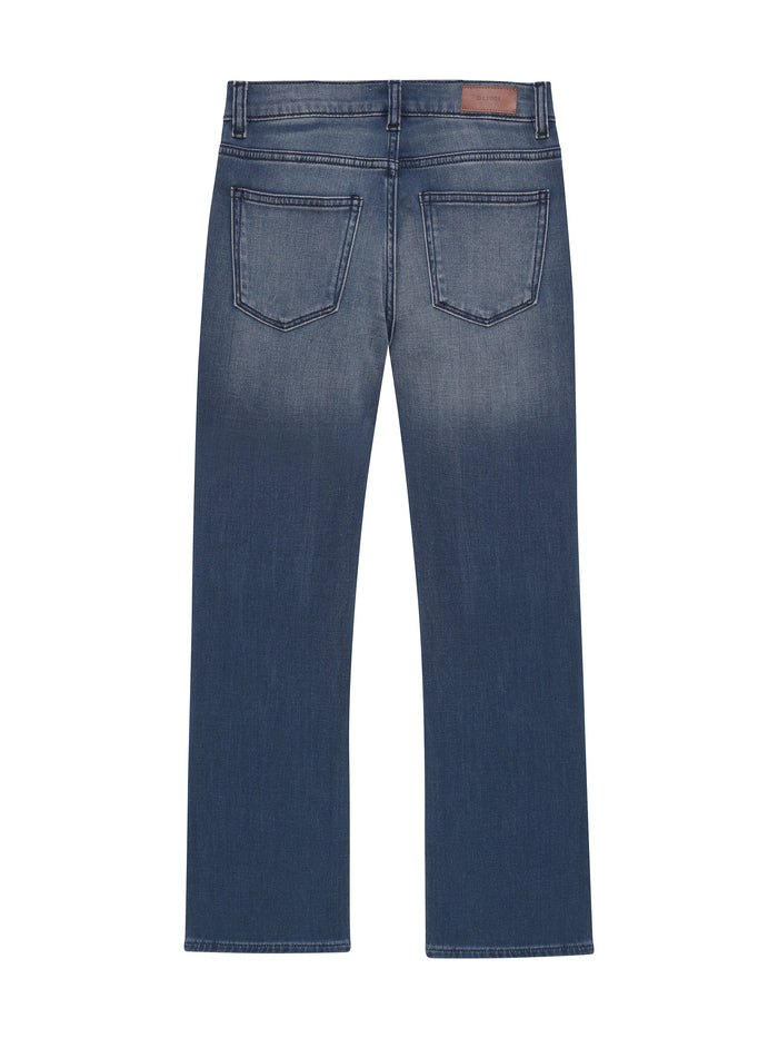 Back view of a pair of blue jeans on a white background