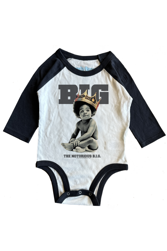 Baby onesie with graphic design and text on a white background