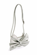 Silver bow-shaped handbag on a white background