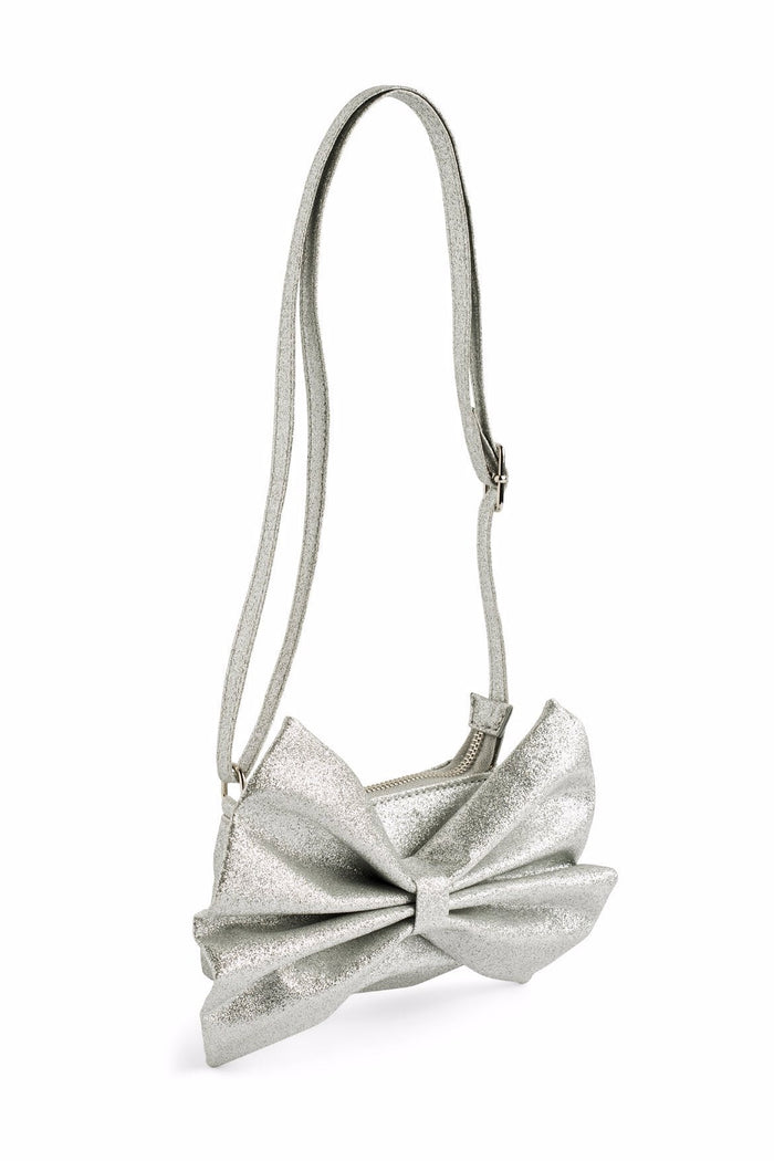 Silver bow-shaped handbag on a white background