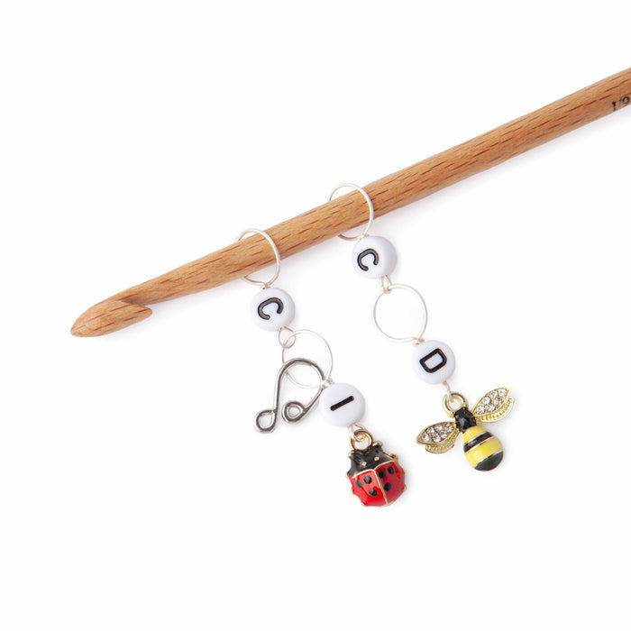 Bug Friends crochet increase and decrease counter set with ladybug and bee charms and letter beads on wooden crochet hook