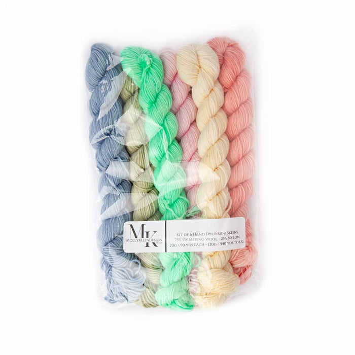 Buggy mini skein yarn pack in clear packaging with Molly Klein Design label showing six pastel skeins
