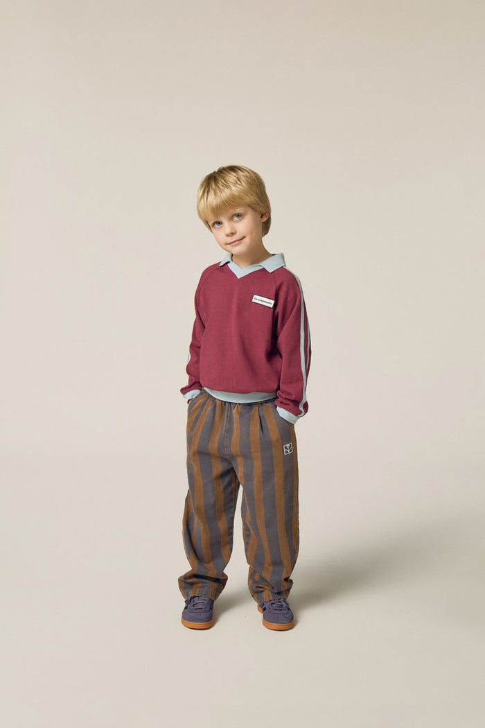 Child wear burgundy polo