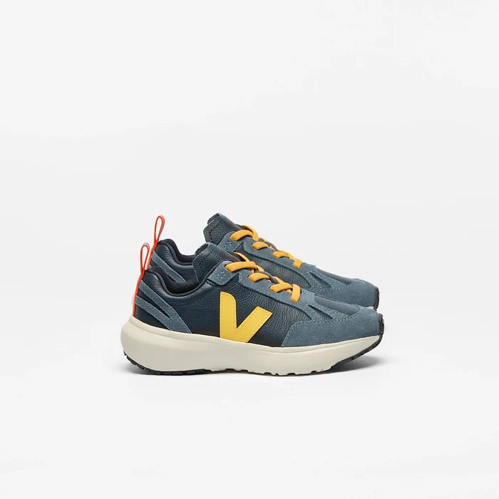 Blue sneakers with yellow logo on a white background