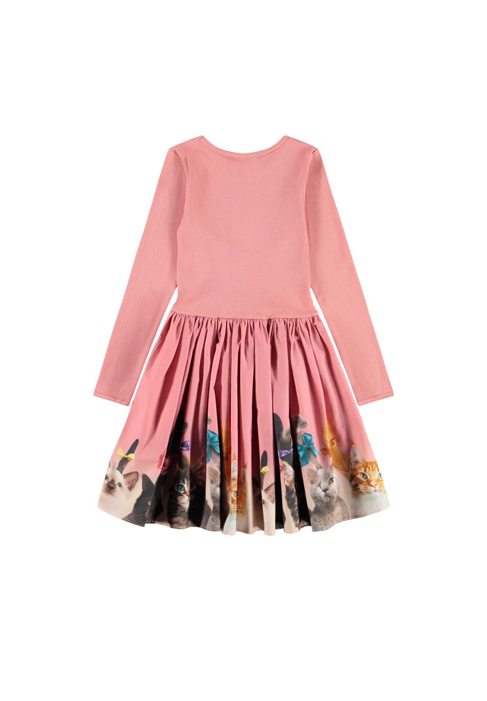 Pink dress with a colorful cat print skirt on a white background