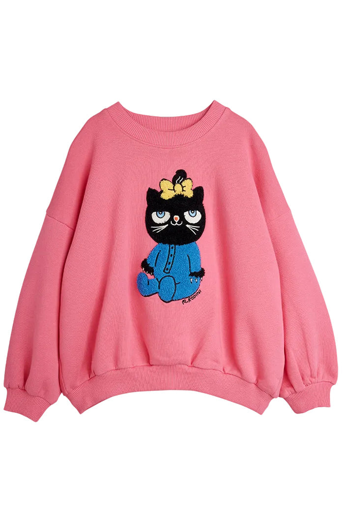 Pink sweatshirt with a black cat graphic wearing a yellow bow on a white background