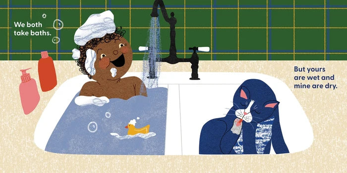 book spread of baby bathing in sink next to cat licking itself