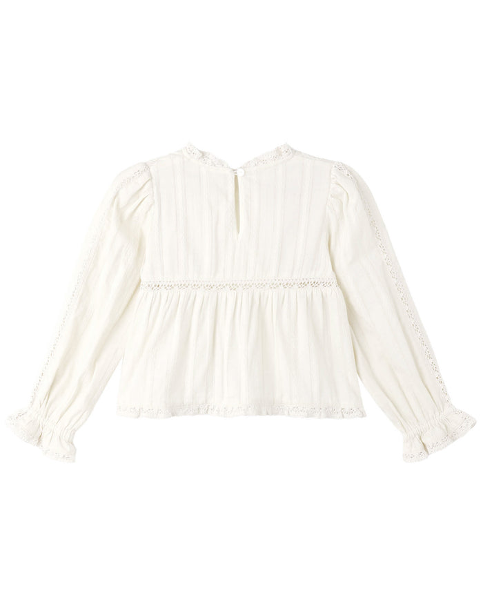 White blouse with long sleeves on a white background