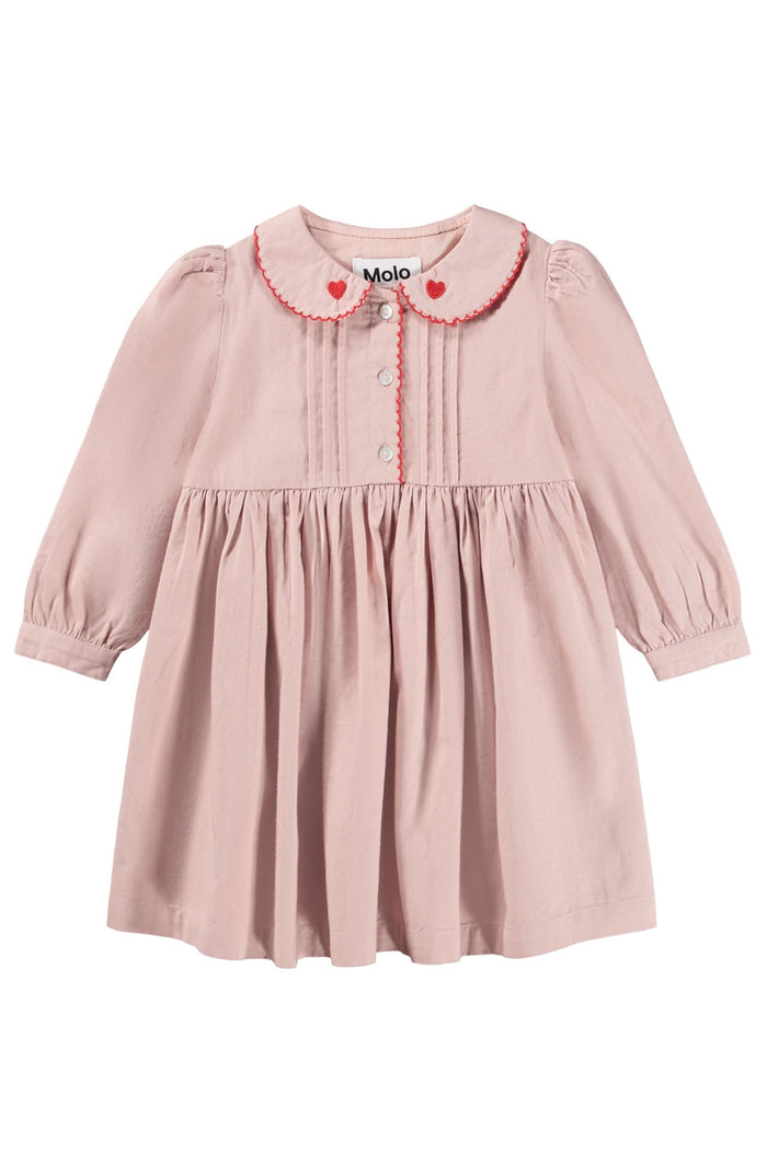 Pink dress with red trim on a white background