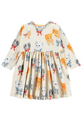 Children's dress with cat and bow pattern on a white background