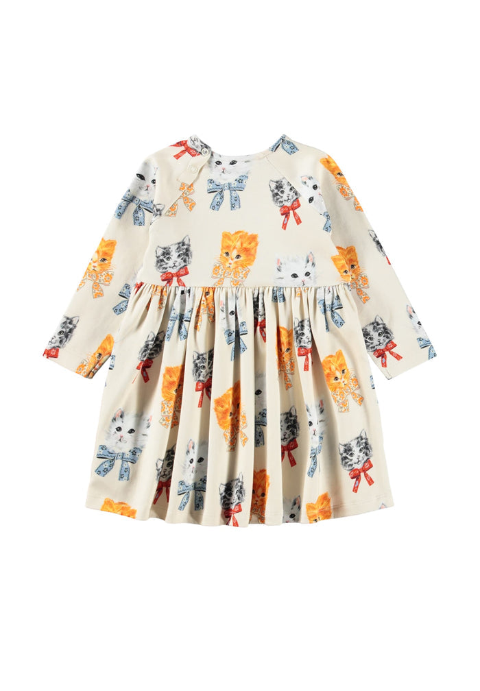 Children's dress with colorful kitten print on a white background