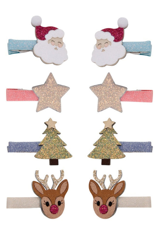 Set of eight Christmas-themed hair clips for girls, featuring Santa Claus faces, glittery stars, Christmas trees, and reindeer heads on pastel-colored elastic bands.