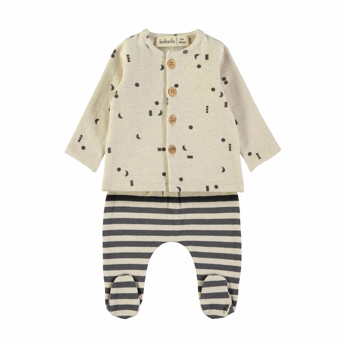 baby two pieceset. beige cardigan with brown buttons and black shapes printd throughout. black and beige striped footed pants on white background.