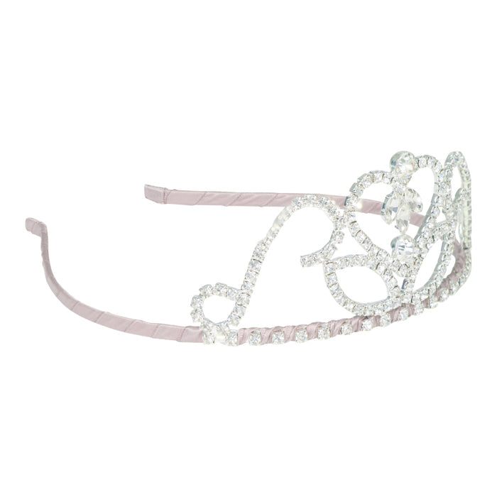 Silver tiara with pink headband on a white background