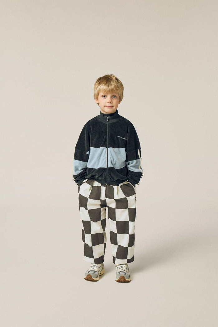 Child wearing Color Block Sweatshirt and Checkered Trousers