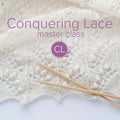 Conquering Lace master class title image showing white lace knitting with intricate openwork patterns, bamboo knitting needles, and the CL logo on a purple circle