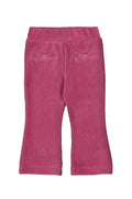 Pink pants with bow details on a white background