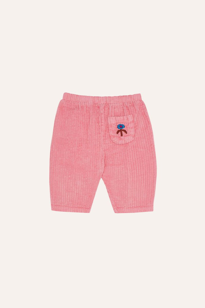 Pink corduroy baby pants.