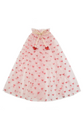 A pink tulle cape with a red bow pattern and hearts at the neck, displayed against a plain white background.