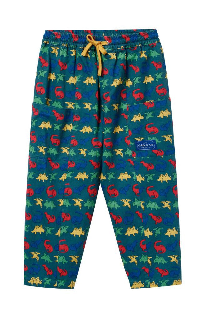 Colorful dinosaur-patterned pants on a white background