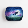 Small hinge-style Dragon Moon storage tin front view showing watercolor dragon silhouette flying past full moon against galaxy night sky with purple nebula and forest treeline