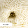 Close-up of Everyday Merino yarn in Natural colorway showing the creamy undyed superwash merino fiber texture