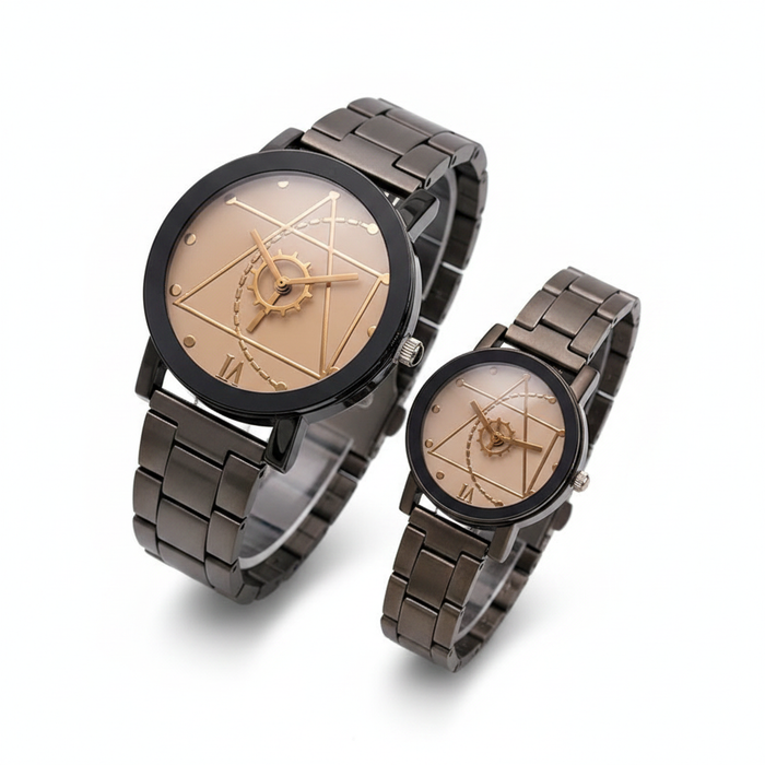 A striking pair of gunmetal-toned watches featuring rose gold geometric dials with alchemy-inspired line art and a unique gear-shaped central hand, presented in a clean, high-end editorial style.