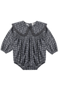Baby romper with heart pattern on a white background