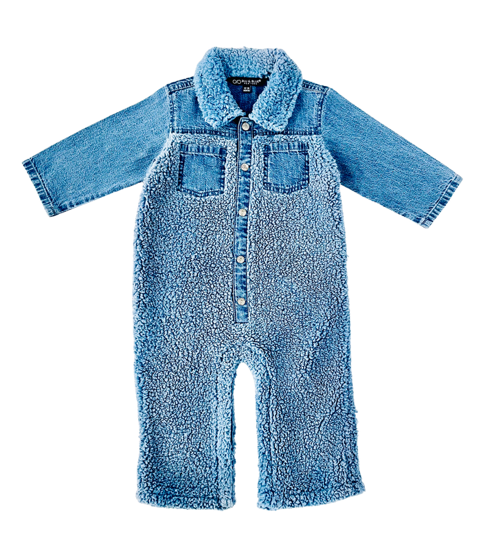 A baby's long-sleeve denim jumpsuit with a plush sherpa collar and matching fleece body, featuring snap-front closure and chest pockets, shown on a plain white background.