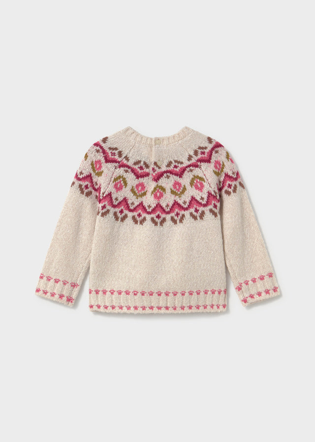 Knitted sweater with floral pattern on a white background