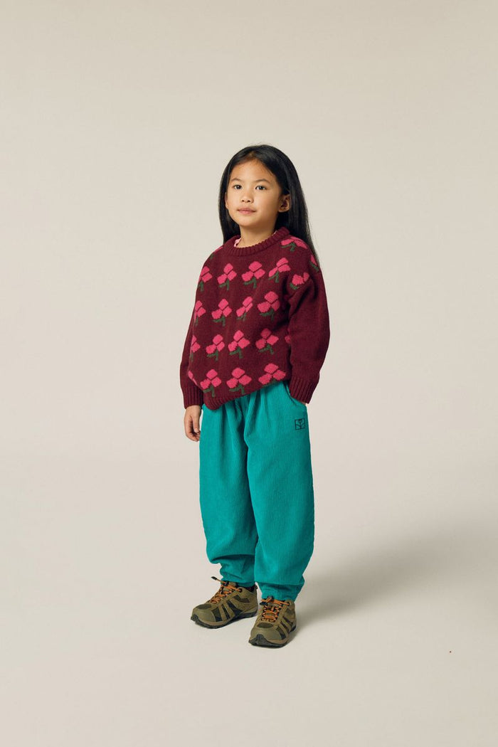 Child wearing Flower Jumper