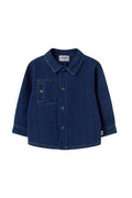Blue denim shirt on a light gray background