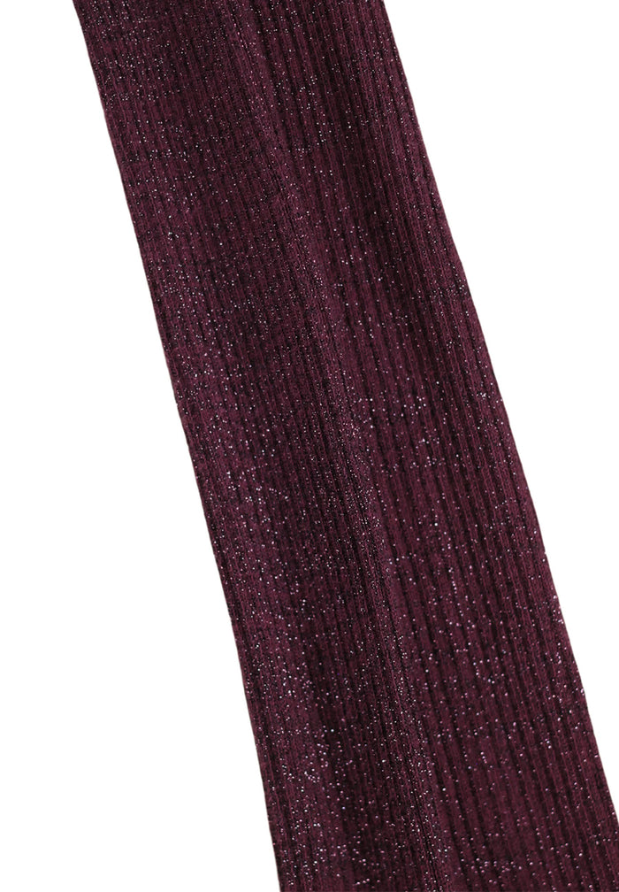 Close-up of a dark purple textured fabric on a white background