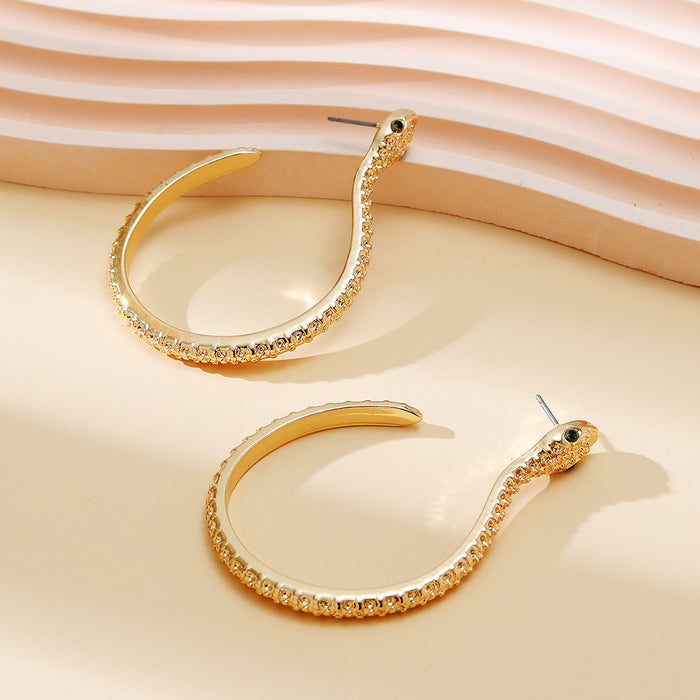 Gold Snake Hoop Earrings with Green Crystal Eyes | Pavé Serpent Jewelry