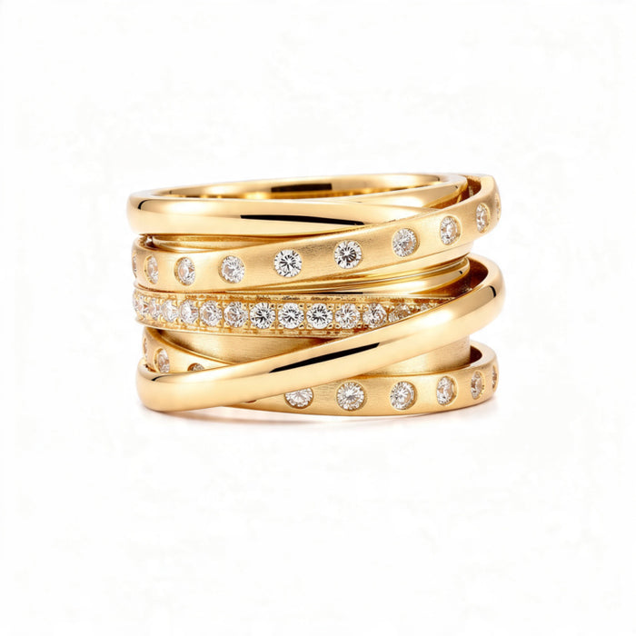 A polished 18K gold statement ring with multiple intertwined bands, featuring rows of small round diamonds, displayed centered on a pure white background.