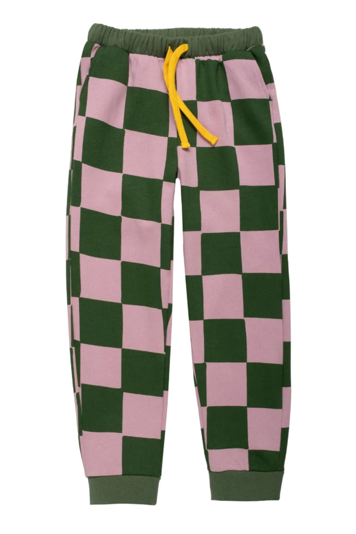 Checkered pants with green and pink squares on a white background