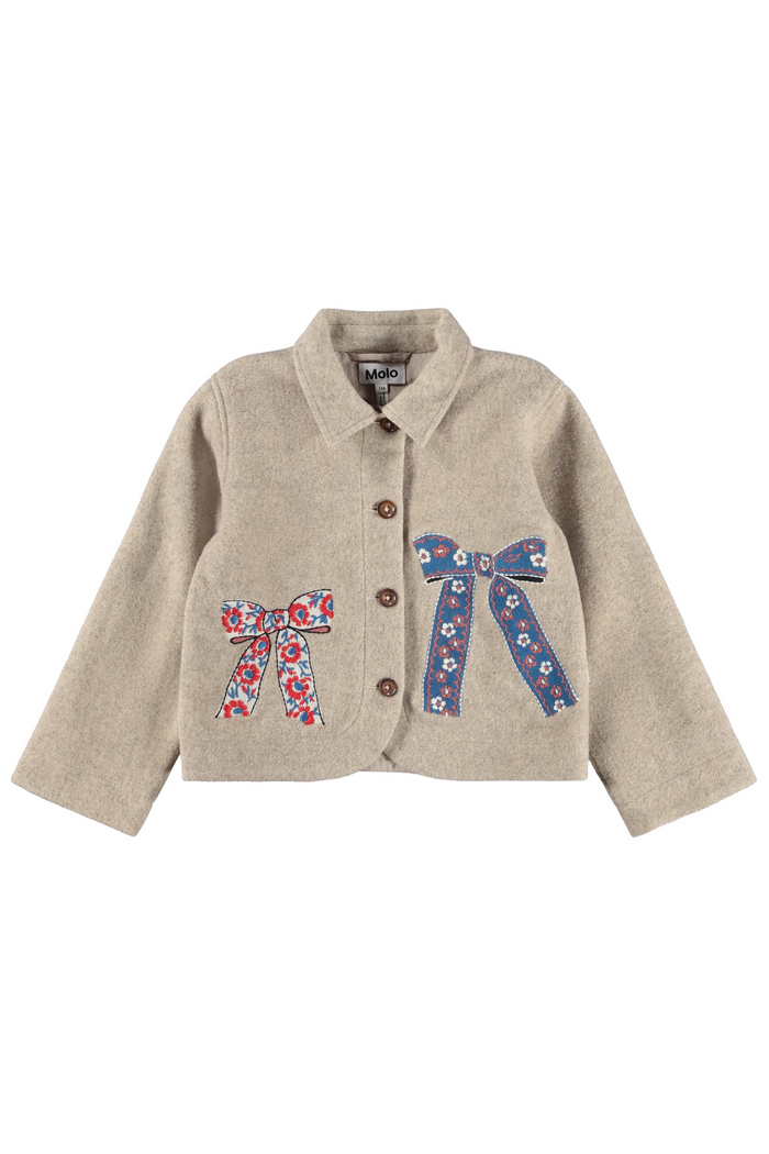 Beige children's jacket with floral and bow designs on a white background